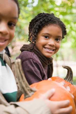 49787911 - kids with pumpkins