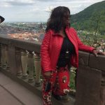 Annita standing on balcony