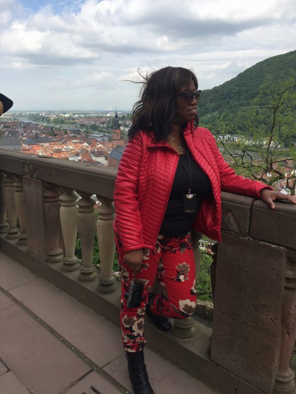 Annita standing on balcony